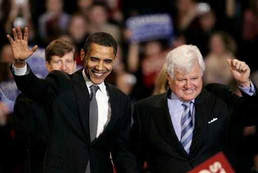 In this Jan. 28, 2008 file photo, Democratic presidential hopeful, Sen. Barack Obama, D-Ill., left, stands with Sen. Edward M. Kennedy, D-Mass., during a rally for Obama at American University in Washington, where Obama was endorsed by Kennedy.