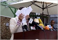 Abdullah Abdullah, main rival to President Hamid Karzai, displayed what he said were illegal ballots intercepted by supporters before last week’s presidential vote.