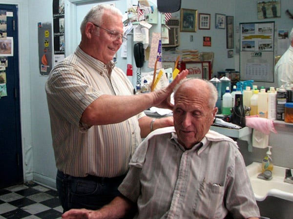 Ray Rivenbark has been cutting hair at his Ideal Barbershop for 43 years in downtown Burgaw. While he gave 30-year customer Clarence Dodgens, 85, a trim on Aug. 17, Rivenbark said he didn't anticipate that the new store would affect his business.