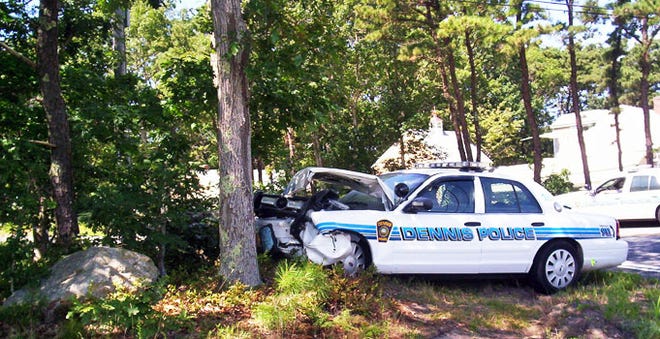 A Dennis police cruiser involved in a car crash Thursday sustained heavy front-end damage.