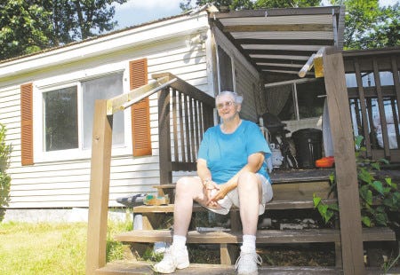 Patricia Morin is behind on her taxes on her Dow Lane home in Exeter but hopes with her current part-time job, she can get caught up. The town is owed more than $3 million in unpaid property taxes, and water and sewer, ambulance and police fees.