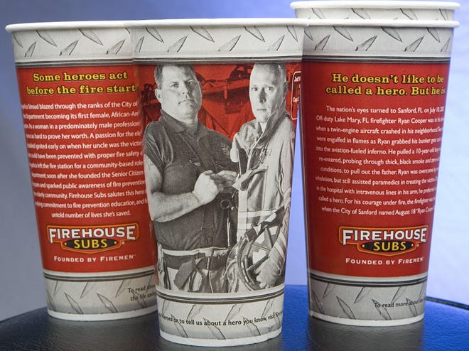 Jeff Werthmuller, above right, who has been a firefighter/EMT and driver for Ocala Fire Rescue for 15 years, and Capt. Mike Magee of Ocala Fire Rescue, at top, are featured on Firehouse Subs' cups, shown above at left. The sandwich chain, which was founded by firefighters, wanted to honor the duo for their heroism in saving the life a crash victim while off duty. Magee serves at Station 5 and Werthmuller works at Station 1.