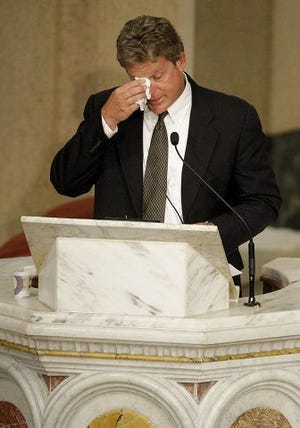 AP photo 
Edward Kennedy Jr., wipes a tear Saturday as he talks about his father at the Roman Catholic Funeral Mass for U.S. Sen. Edward M. Kennedy.