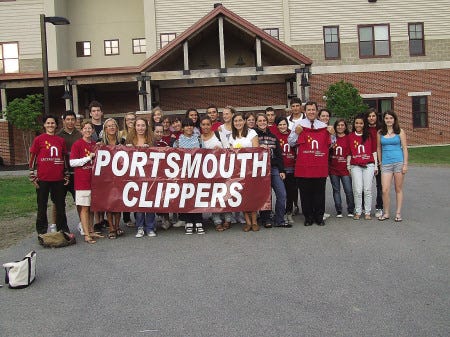 Exchange students from Cáceres, Spain, arrive at Portsmouth High School on Friday to meet their host families.