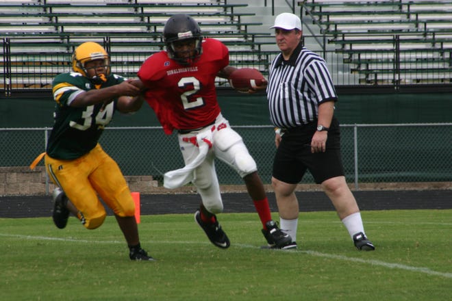 Gonzales' T. J. Miles sacks Donaldsonville's Jaquel Gant in the first half Saturday afternoon.
