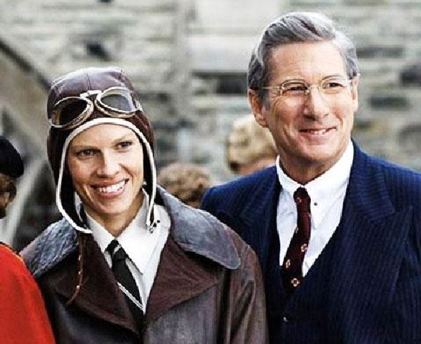 Oscar winner Hilary Swank, as Amelia Earhart, appears with Richard Gere in “Amelia.”