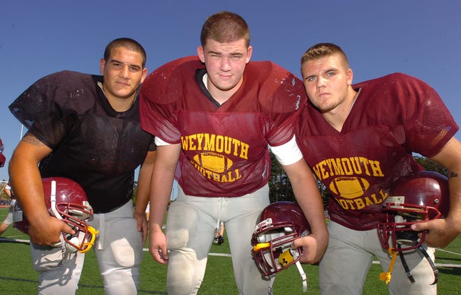 Weymouth High football captains, from left, Sam Calley, Dan Murphy and Dylan Garvey will lead the Wildcats into the teeth of the Bay State Conference this season.

(Photo by Gary Higgins - The Patriot Ledger)