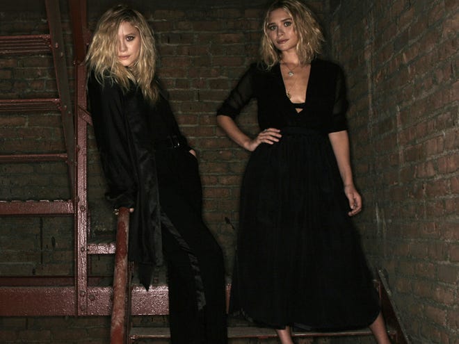 Mary-Kate, left, and Ashley Olsen at their Manhattan warehouse on Aug. 21, 2009. The twins have emerged as unlikely designers with their clothing lines The Row, and Elizabeth and James.