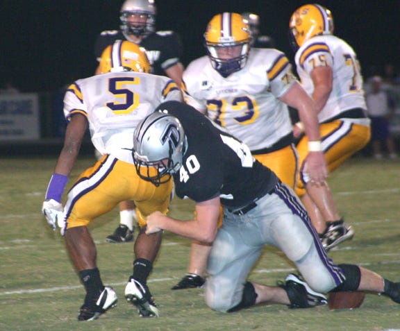 Dutchtown’s Devon Bercegeay forces a fumble against Lutcher last week. The Griffins held West Jefferson to just one score in a 10-7 victory Friday night at Hoss Memtsas Stadium.