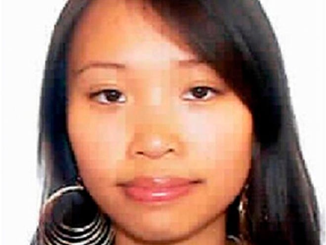 This undated photo released by New Haven Police Dept., shows Yale graduate student Annie Le who disappeared on Sept. 8, 2009. Police on Sunday said they found what they believe is the body of the graduate student and bride-to-be hidden inside the wall of 10 Amistad, a university building where she was last seen.