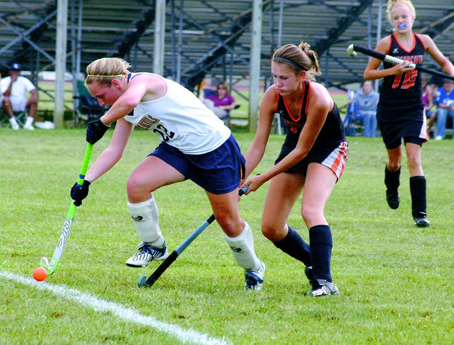 G-A’s Jenna Lehman moves the ball past a Susquenita player in a varsity field hockey game Tuesday in Greencastle.