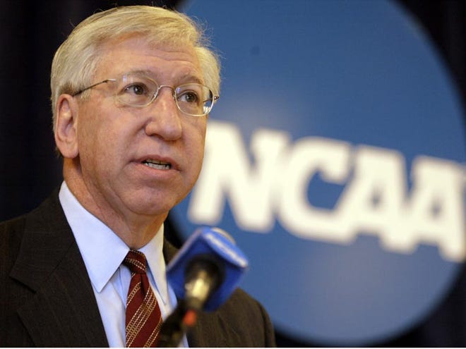 In this Feb. 4, 2004, file photo, NCAA president Myles Brand announces an agreement between the NCAA and local officials which would pave the way for the NCAA to bring a number of high profile events to Indianapolis, during a news conference in Indianapolis. The NCAA says Brand has died after battling pancreatic cancer. He was 67. The university president turned NCAA chief who pushed for tighter academic standards in college sports and took on Bob Knight died Wednesday, Sept. 16, 2009.