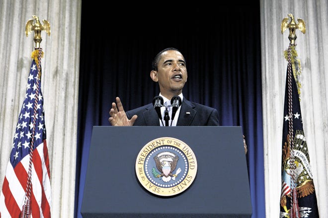 In this Sept. 14, 2009, file photo President Barack Obama speaks about the financial crisis on the anniversary of the Lehman Brothers collapse at Federal Hall on Wall Street in New York. Obama pledged to avoid "self-defeating protectionism" in continuing the effort to get the U.S. and other major world economies back on their feet. Still, he told the Wall Street audience, "no trading system will work if we fail to enforce our trade agreements."