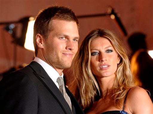 In this May 4, 2009 file photo, Tom Brady and Gisele Bundchen arrive at the Metropolitan Museum of Art's Costume Institute Gala in New York.