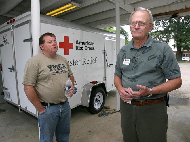 Red Cross director of emergency services Bill Marable, right, and volunteer Larry White talk about new mobile units they received at the Red Cross headquarters in Tuscaloosa, Ala. Thursday, Sept. 17, 2009. The Tuscaloosa brach of the Red Cross received two mobile sheltering units which each have enough supplies to service 100 people.
