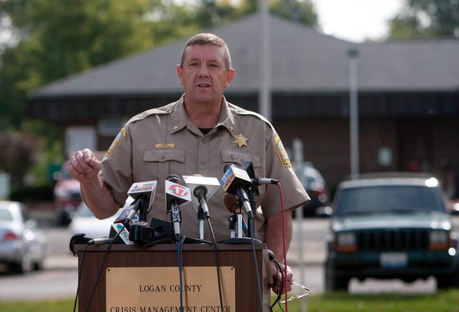Logan County Sheriff Steve Nicholas talks Wednesday, Sept. 23, 2009, to the media about the Gee family murders in Beason during a news conference in Lincoln.