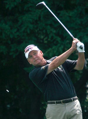 The second round of the Men's City Golf Tournament took place Sunday at Bunn Park golf course. Dave Ryan, 55, back in the tourney for the first time since 2002 and seeking his first title since 2000, watches his drive from the 14th tee Sunday.