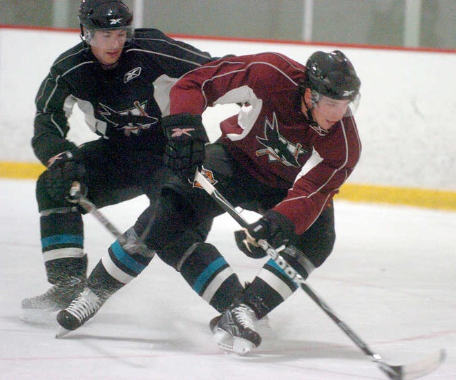 Worcester’s Jon Landry, left, and Devon LeBlanc, right, skate at practice this week at the New England Sports Center.