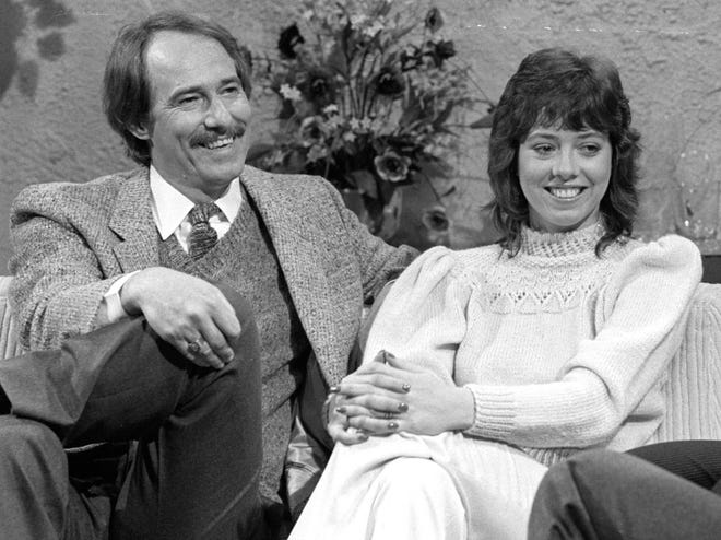 This March 5, 1981, file photo shows John Phillips of the pop group ‘The Mamas and the Papas,’ left, and his daughter Mackenzie during a taping of the John Davidson show in Burbank, Calif.