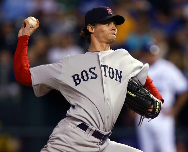 Boston Red Sox starting pitcher Clay Buchholz throws in the first inning of a baseball game against the Kansas City Royals on Thursday, Sept. 24, 2009, in Kansas City, Mo. (AP Photo/Ed Zurga)