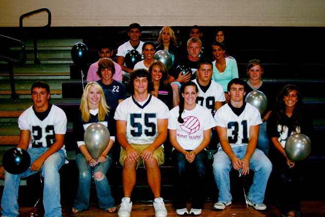 Monmouth-Roseville High School announced their 2009 homecoming court on Friday. 

Front row, from left to right: senior attendant Nick McLaughlin, senior attendant Nicole Potter, king Derek Therrien, queen Claire McGuire, senior attendant Patrick Thompson and senior attendant Chelsey Duncan. Second row, from left to right: junior attendants Gatlin Marlow and Amber Kurdi, junior runners up Justin McKee and Alexis Hendrix. Third row, from left to right: sophomore attendants Brijido Ortiz and Rachel Munoz, sophomore runners up Nick Nobling and Vanessa Arteaga. Fourth row, from left to right: freshman runner up Joey Sinclair, freshman attendant Jasmine Padilla, freshman attendant Carlos Ruiz and freshman runner up Sydney Enderlin. 

Homecoming week is next week for MRHS, when they'll celebrate each day with a different outfit theme: Pajama Day (Monday), What Not to Wear (Tuesday), Thriller Day (Wednesday), Cowboy/Cowgirl Day (Thursday) and Spirit Day (Friday).