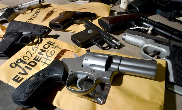 Hand guns that were seized by the Barnstable Police Department in this 2004 file photo.