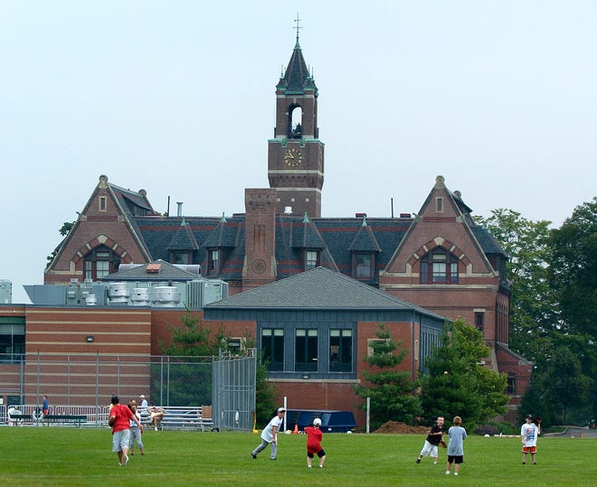 Children play on the fields at Thayer Academy in Braintree.