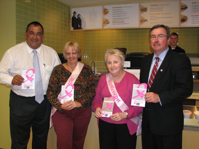 Cumberland Gulf Group CEO Joseph Petrowski, left, and Donald J. Gudaitis, right, CEO of the American Cancer Society’s New England division, display the first pink ribbon placards designed to help support the society’s Making Strides Against Breast Cancer set for Sunday in Boston. They are joined by Cumberland Farms employees and breast cancer survivors Charlene Gomes, 2nd left, and Paula Tangney. Starting Thursday and throughout October, consumers can purchase the pink ribbon placards for a $1 and $3 donation at any Cumberland Farms store. All proceeds will be donated to Making Strides Against Breast Cancer. Cumberland Gulf Group is based in Framingham.