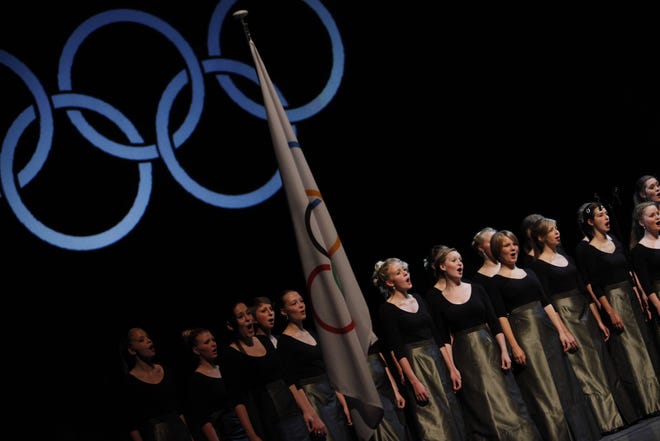 Performers sing Thursday at the opening ceremonies of the 121st International Olympic Committee Session and XIII Olympic Congress at the Copenhagen Opera House in Denmark. Chicago, Madrid, Rio de Janeiro and Tokyo are competing to host the 2016 Summer Olympic Games, and the committee will choose the winning city in a vote on Friday.