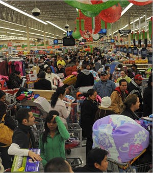 Shoppers flocked to Wal-Mart after Thanksgiving last year.
