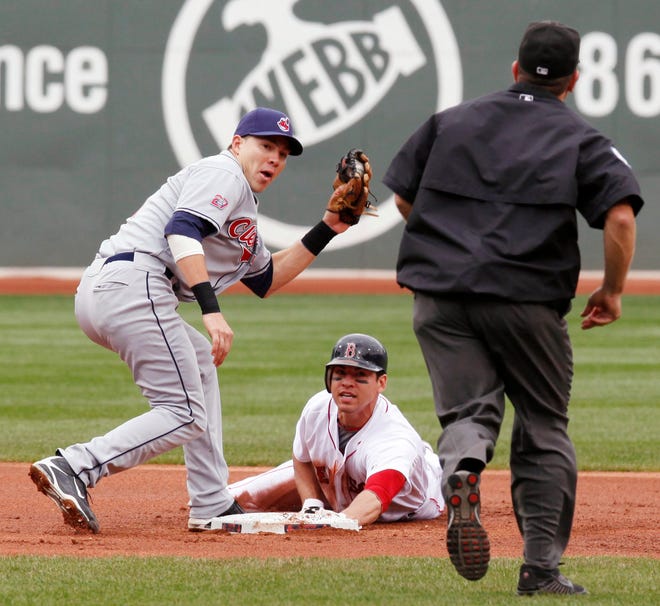 Jacoby Ellsbury, steals second base as the Indians' Jhonny Peralta looks for the call in the first inning of the Red Sox' victory on Sunday at Fenway Park.