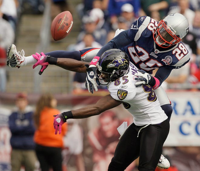 Patriots cornerback Darius Butler breaks up a pass to Baltimore Ravens wide receiver Derrick Mason in the end zone during the second quarter of the Patriots' victory on Sunday in Foxboro.
