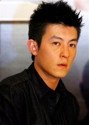 In this April 5, 2009 file photo, Hong Kong movie star Edison Chen speaks at a press conference for the new film he stars in titled "The Sniper" in Singapore. The 28-year-old Chinese-Canadian actor-singer will feature in the English-language comedy, "Almost Perfect," which stars Kelly Hu, according to the Web site of New York-based production company Slew Pictures.