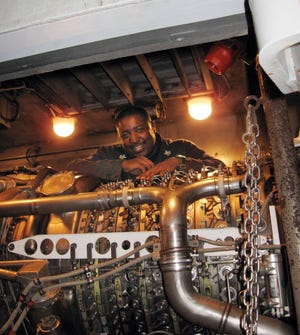 TIMOTHYJ. GIBBONS/The Times-UnionPetty Officer 1st Class Kevin Limbrick cares for a gas turbine engine, which was a major innovation when it was introduced.