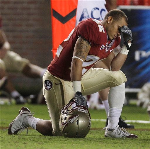 Florida State Korey Mangum reacts following an NCAA college football game against Georgia Tech Saturday, Oct. 10, 2009, in Tallahassee, Fla. Florida State lost 49-44.