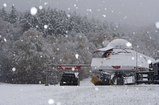 Courtesy Photo/Waterville Valley-Jeremy Gasowski
 THE SEASON'S first snowfall arrived in a big way at Waterville Valley Resort where the snow was falling heavily enough to accumulate on the ground Tuesday.