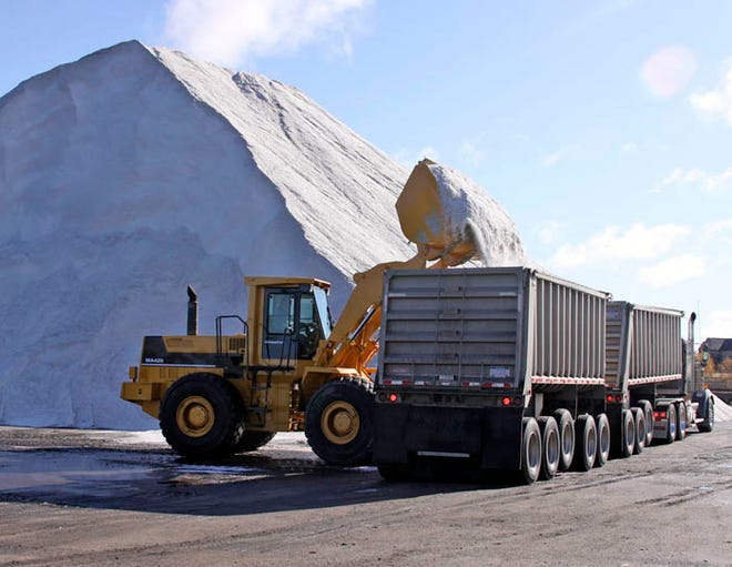 A front end loader and truck loaded up salt at the Carbide Dock on the St. Marys River Tuesday afternoon. Tri-County, out of Waterford, Mich. and owned by Ed Holm loaded salt into an available truck and headed west to either Mackinac or Luce county.