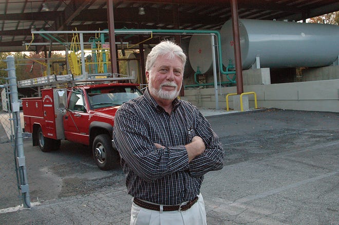 Mark Allen, president of W.H. Riley & Son Inc., stands near the entrance to the fuel storage facility of his company’s Winter Street site in Taunton.