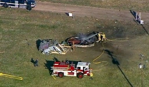 This image made from video provided by KSL-TV shows, firefighters putting out a fire at an empty tin shack after an F-16 jettisoned two 500-pound bombs and two fuel tanks on the base just before making an emergency landing at the Hill Air Force base in Utah on Thursday Oct. 22, 2009.