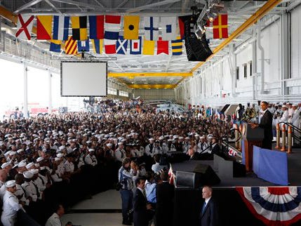 President Barack Obama talks to service men and women at the Naval Air Station in Jacksonville, Fla., Monday, Oct. 26, 2009.