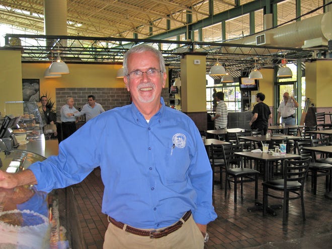 KEVIN TURNER/The Times-UnionJim Anderson, general manager of the new Village Bread Cafe at The Jacksonville Landing, says his staff will be ready to accomodate customers during the busy period surrounding the Florida-Georgia game.