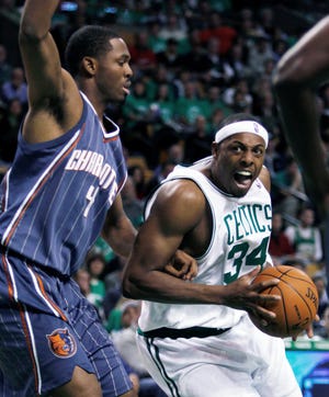 Celtics captain Paul Pierce looks to shoot against Charlotte's Derrick Brown in Boston's 92-59 win over the Bobcats.