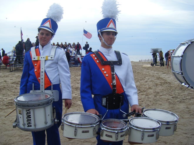 Saugatuck Marching Band percussionists Kyle Beery, left, and Alex Winter prepare for their film debut in a “What’s Wrong with Virginia” scene shot Monday in South Haven.