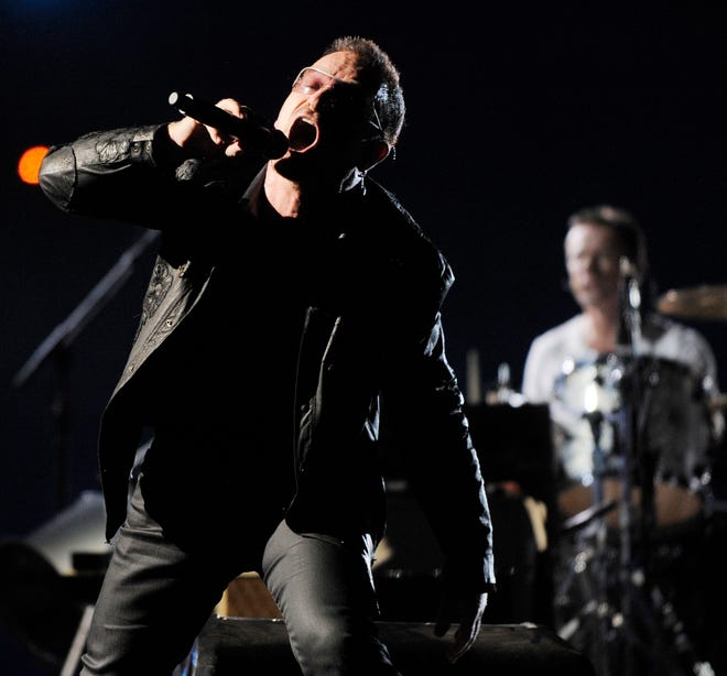 Bono leads U2 in a song during their “360” world tour stop in Pasadena, Calif., on Sunday.