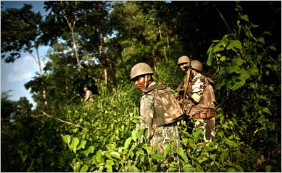 Indian officers patrolled a forest around their base in Barsur, right on the edge of rebel-controlled territory in Chattisgarh.
