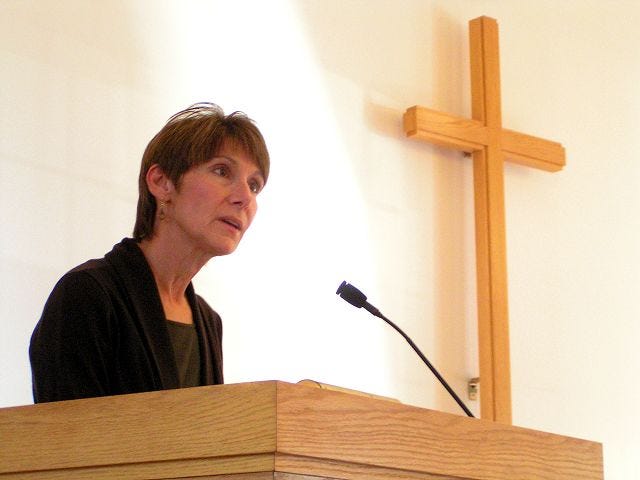 HARRISON HAAS/CITIZEN PHOTO Executive Director of Community Health and Hospice Margaret Franckhauser delivers a reading during the organization's service of remembrance and thanksgiving on Sunday afternoon at the Good Shepard Lutheran Church.