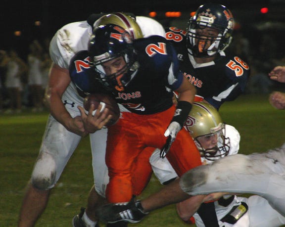 Ascension Christian’s Dustin?Blanchard keeps against False River Acadey for a 7-yard gain in the third quarter of the Gators 40-14 victory Thursday night at Lion?Field.