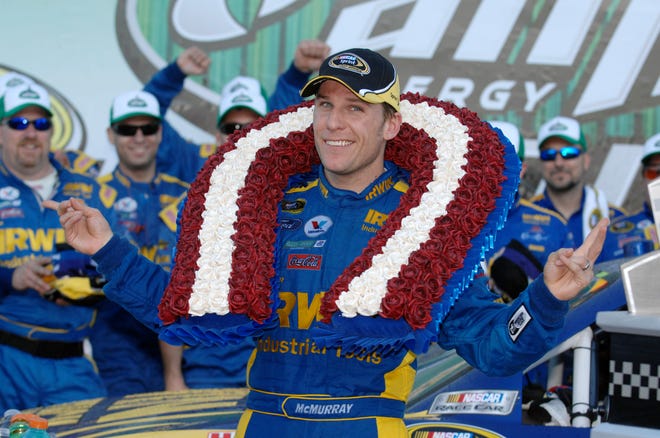 Jamie McMurray celebrates after winning the AMP Energy 500 NASCAR Sprint Cup Series race Sunday at Talladega Superspeedway in Talladega, Ala.