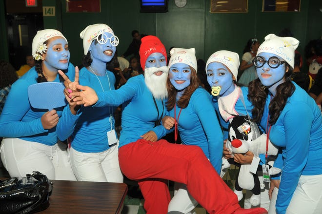 The Smurfs, from left, are Ariana Davis, Kretsy Mondesir, Jasmine Offley, Jessica Arguello, Alicia Mizell and Lisbeth Acosta.
