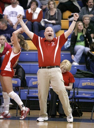 Northwest volleyball head coach John Rafailedes and player Lauren Steiner react to the Indians winning in three games, 25-23, 25-13, 25-14, against Celina in a Ontario Division II regional semifinal Thursday night. Northwest faces defending state champion Padua in Saturday’s 2 p.m. regional final.